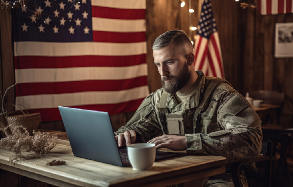 A militiary veteran using a laptop for research