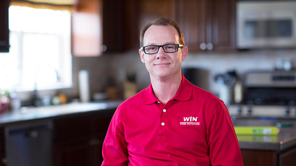 Jason Vernier, a 22-year U.S. Navy veteran and WIN franchisee in Fishers, IN, shows his support for the troops by participating in Red Shirt Fridays.