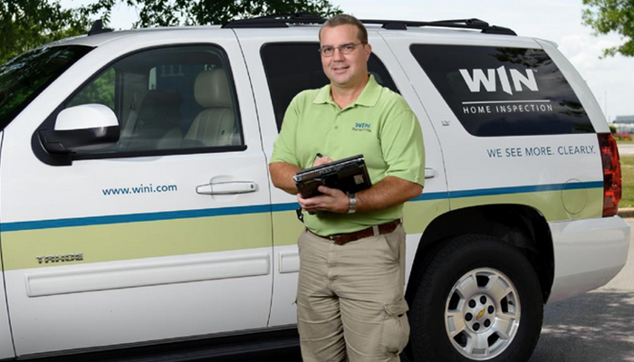 WIN Home Inspection Business Owner in front of van