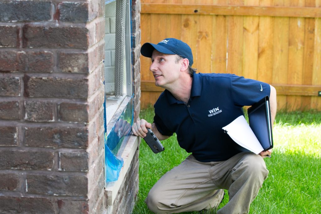 home inspector inspecting a home