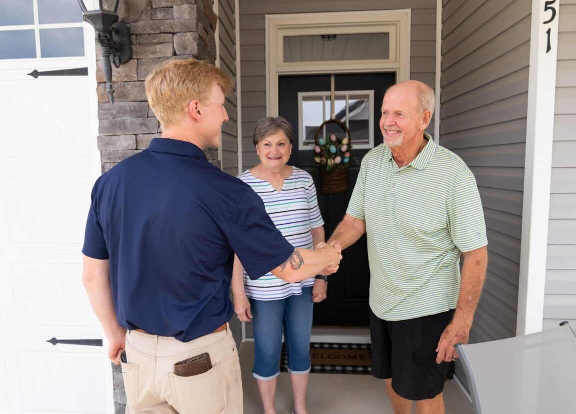 WIN Home Inspector Shaking Hands with Client