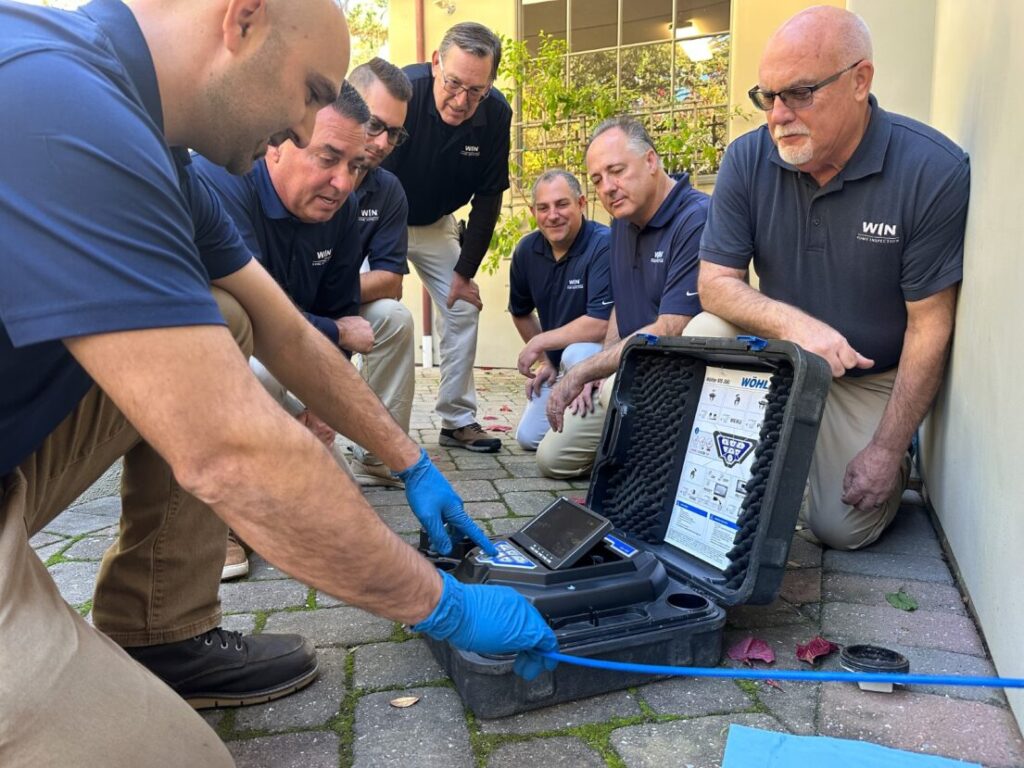 WIN Home Inspectors Getting Training for Sewer Scope Inspection