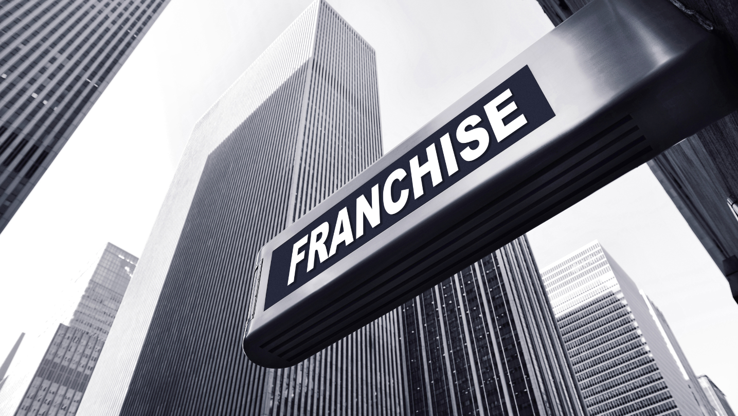 franchise sign board on a high rise building