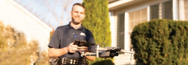 home inspector flying drone