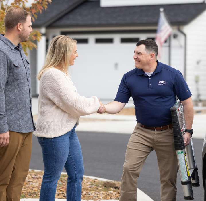 Home inspector with a happy client