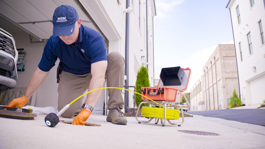 WIN Home Inspector doing a sewer scope inspection